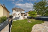 Gartenansicht - Charmantes Einfamilienhaus mit großzügiger Südterrasse in zentraler Lage