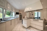 Küche - Wohnkomfort auf höchstem Niveau- Architektenhaus in unverbaubarer Feldrandlage