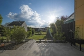 Terrasse - Ruhig gelegenes, energetisch saniertes Reihenmittelhaus mit Garten und Garage