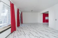 Wohnzimmer m. Zugang zur Terrasse