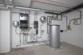 Heizraum UG - Ruhig gelegenes, energetisch saniertes Reihenmittelhaus mit Garten und Garage