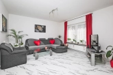 Wohnzimmer - Ruhig gelegenes, energetisch saniertes Reihenmittelhaus mit Garten und Garage