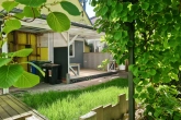 idyllischer Blick zur Terrasse - Modernisiert & gepflegt – kleines Haus mit großem Wohngefühl in Linkenheim