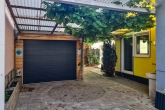 Garageneinfahrt - Modernisiert & gepflegt – kleines Haus mit großem Wohngefühl in Linkenheim