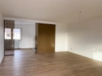 Wohnzimmer - Renovierte 2,5 Zimmer-Wohnung in Wiesental – Ideal für Singles und Paare mit mit moderner Einbauküche!