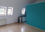 Wohnzimmer (aufgenommen 2022) - Außergewöhnliche 2-Zimmer-Wohnung mit Dachterrasse und TG-Stellplatz (vermietet)