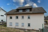 Langjährig vermietetes Dreifamilienhaus in Oberöwisheim - rückwärtige Ansicht
