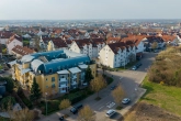 Luftaufnahme - Außergewöhnliche 2-Zimmer-Wohnung mit Dachterrasse und TG-Stellplatz